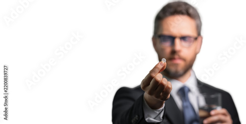 Millennial businessman having headache. Business man in suit suffer from migraine or headache. Tired exhausted man suffering from headache. Banner, copy space.