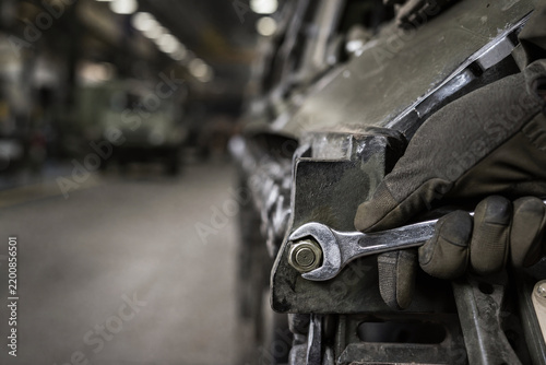 Macro Close Up Military Mechanic Hand Holding Wrench Vehicle Repair