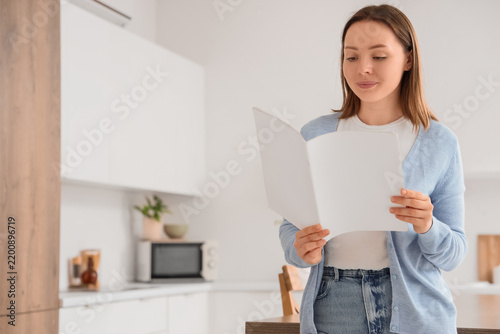Self improvement and personal growth, woman reading a blank magazine or broch...