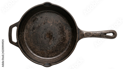 A seasoned heavy metal frying pan sits ready for culinary tasks because many professional chefs prefer using durable cast iron cookware when preparing traditional hearty meals at home every day