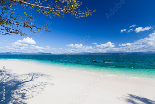 A pure tropical island on a sunny summer day.