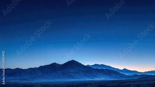 Serene Mountain Landscape Under Clear Night Sky at Dusk