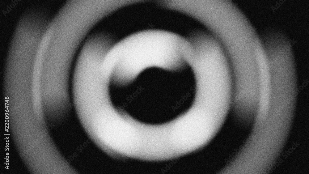 Fototapeta premium Abstract monochromatic circular pattern with grainy texture. Dynamic blurred concentric rings create a modern radial motion background