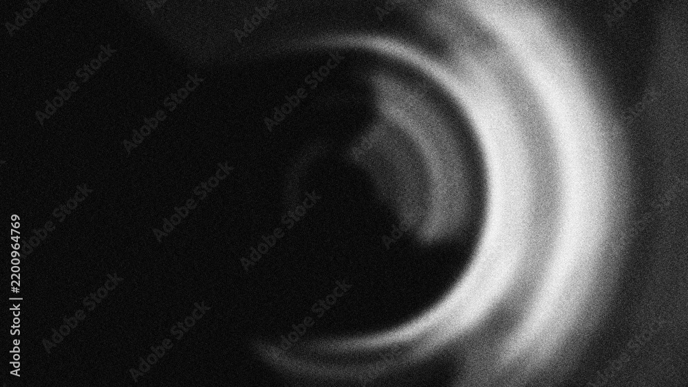 Fototapeta premium Monochromatic concentric rings with a grainy blur texture create a hypnotic radial effect, perfect for abstract motion backgrounds