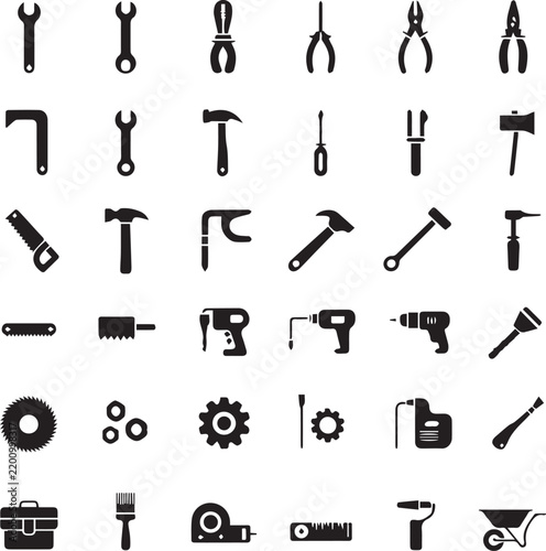 Set of thirty-five black representing various construction and hand tools, including hammers, wrenches, drills, and saws