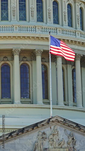 Flag Day concept. Capitol in Washington DC with American flag. Independence Day. US Capitol with American flag. American Capitol government with US flag.