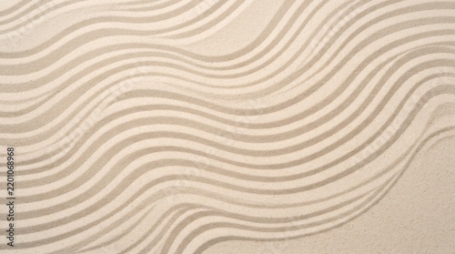 Raked sand patterns in a zen garden with wavy lines and textured surface