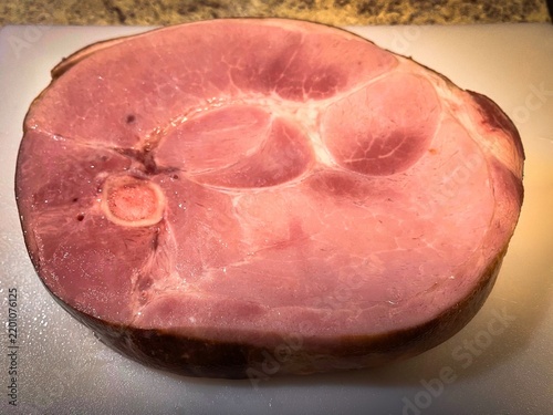 Thick Bone-In Ham Steak on Cutting Board