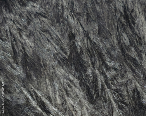 Canvastavla Vertical high-resolution macro photography of dark crystal formation with dynami