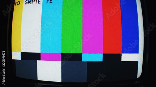 Television test pattern signal with static during a broadcast interruption in a dark studio