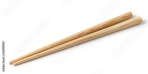Wooden chopsticks arranged diagonally on a clean white background for culinary presentation.
