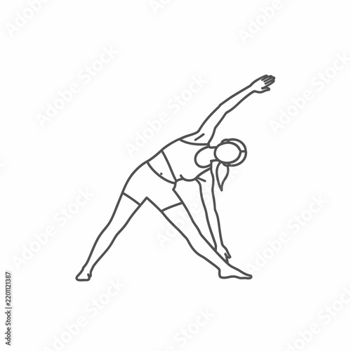 Woman doing yoga triangle pose.