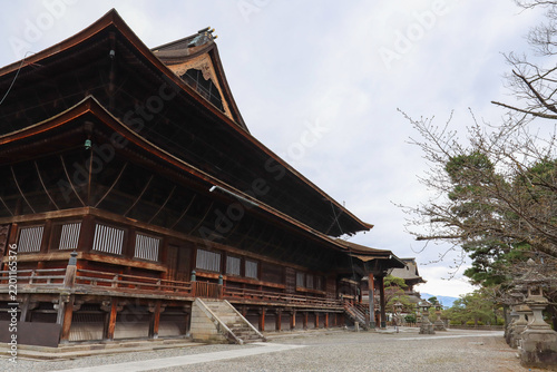 Historic Buddhist temple building with traditional wooden construction at Zenko-ji Temple in Japan
