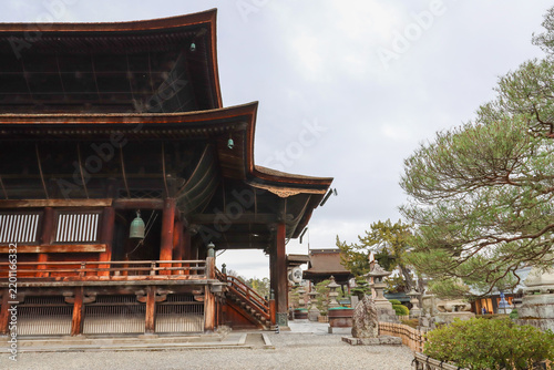 Traditional Buddhist architecture and temple courtyard at Zenko-ji Temple in Nagano, Japan