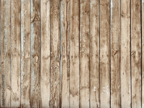 Weathered natural wooden planks with rustic texture and vertical grain background