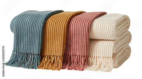 Fotografía Folded ribbed knit blankets in blue yellow pink and cream with fringe edges