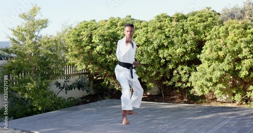 Lifestyle videos outdoor of people doing activities, Practicing martial arts, man in karate uniform