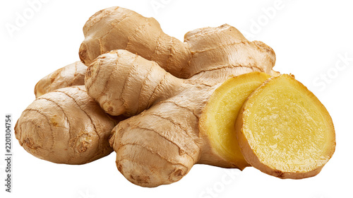 Fresh raw ginger root with sliced pieces showing yellow fibrous texture