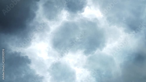 Dark Storm Clouds with Lightning Flashing Across the Sky