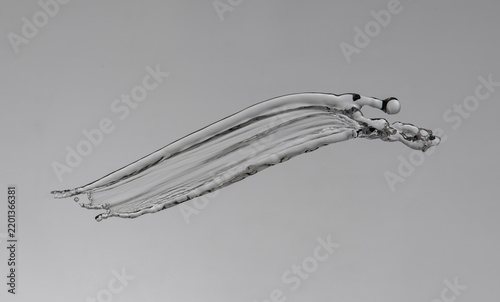 clear water splashes on grey background