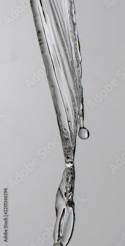 clear water splashes on grey background