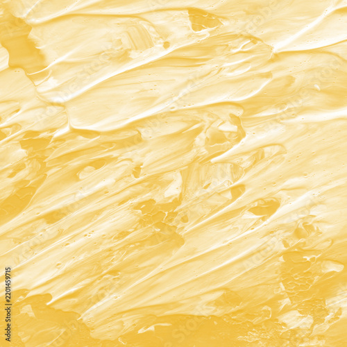 Yellow paint splash wit bold abstract brush texture