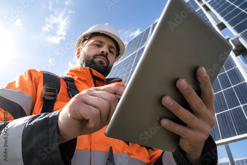 Solar monitoring technology emphasized through an unconventional low viewpoint.