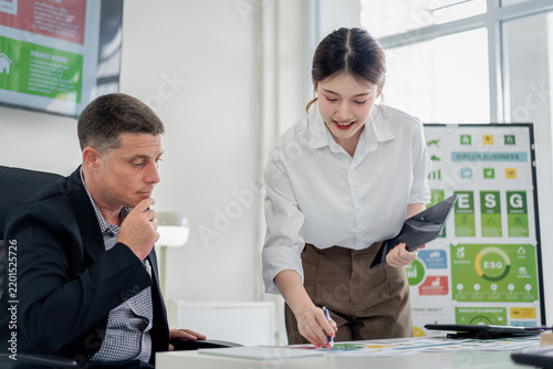 Business Professionals Discuss ESG Green Business Strategies for