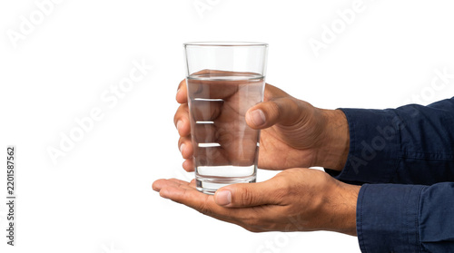 Фотография Clear glass filled halfway with fresh drinking water supported by two hands isol