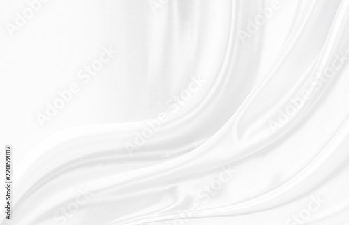 White gray satin texture that is white silver fabric silk background with beautiful soft blur pattern natural.