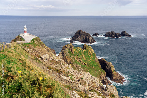 Ortegal lighthouse in the Ortegal Cape in a sunny day. A Couña, Galicia, Spain.
