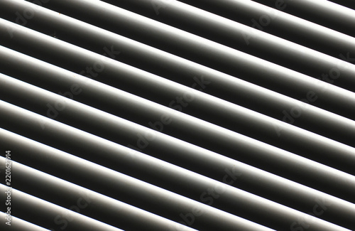 abstract background with closed blinds in the sunlight