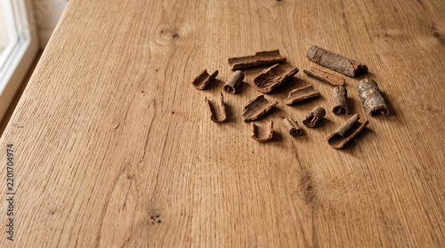 Raw Wooden Tabletop with Cinnamon Fragments | Autumn Background
