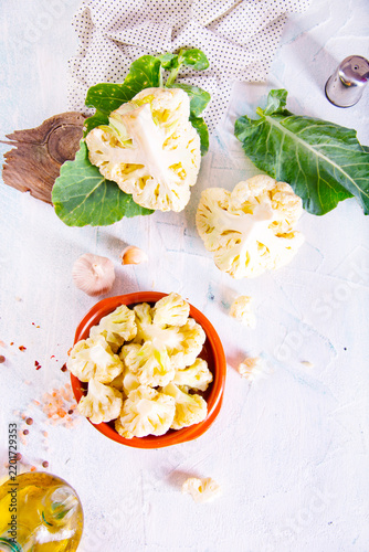 Head of cauliflower sits on a light table