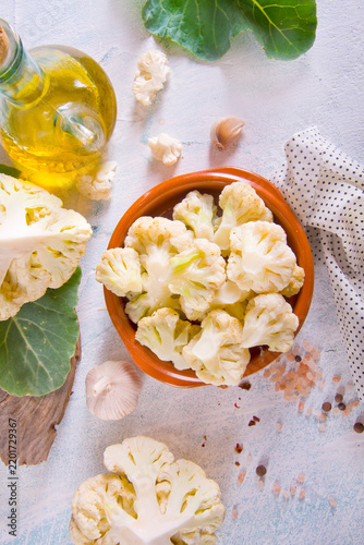 Head of cauliflower sits on a light table