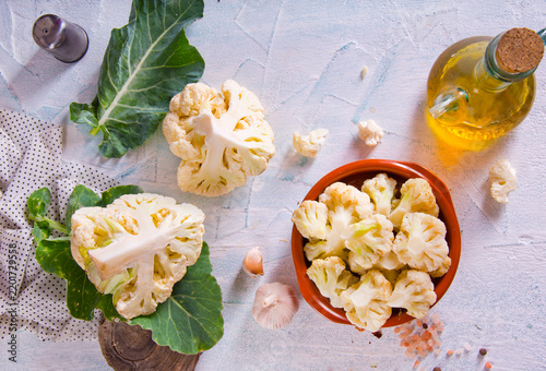 Head of cauliflower sits on a light table