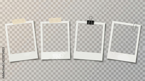 Four empty instant photo frames with tape and clips on a transparent checkered background, perfect for displaying memories.
