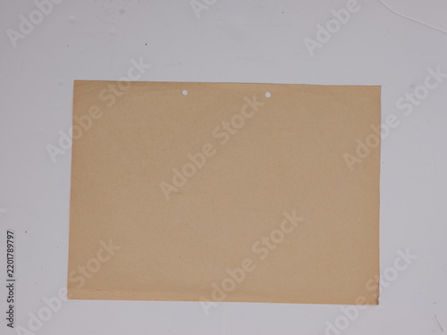 Collection of old antique paper sheets in different warm tones with aged surfaces, stains and natural textures, photographed from above.