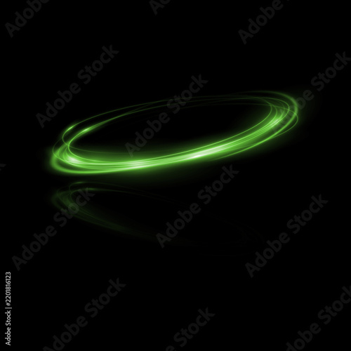 Картината върху платно Abstract green light streak forming a dynamic elliptical orbit on black backgrou