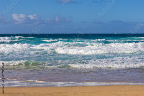 Panoramic view of the turbulent turquoise waves of the Atlantic Ocean – Canary Islands, Fuerteventura; background or wallpaper for your project