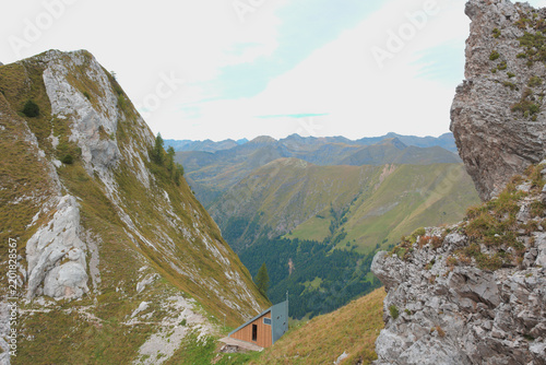 The mountain saddle of Passo di Valzellazzo, and the Corini alpine bivouac, in the Orobie Alps. Lombardy, Italy.