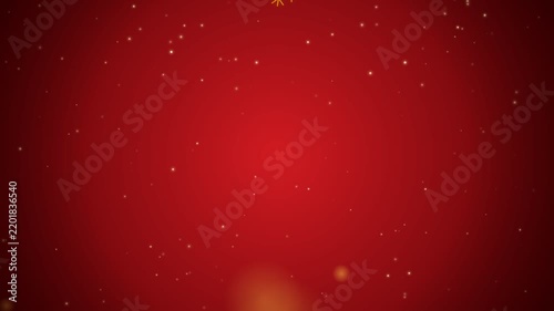 Golden snowflakes falling on red bokeh background
