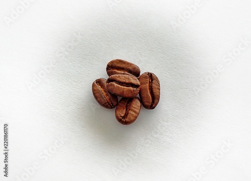Foto Mainz, Rhineland Palatinate, Germany: Roasted coffee beans arranged on white textured background with generous copy space