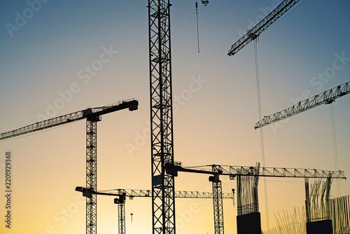 Tapety artystyczne construction site with cranes