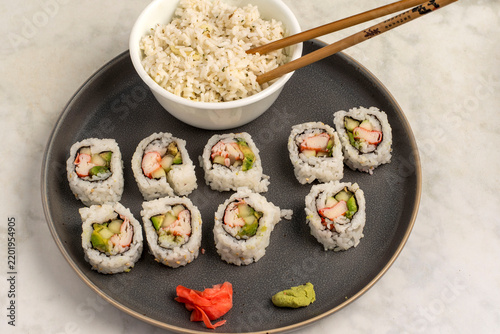 Obraz na płótnie bowl of white rice  with california roll