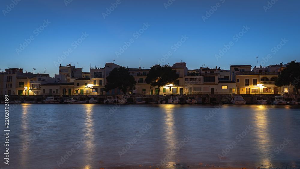 Obraz premium NIght View of Portocolom Harbor with Boats, Mallorca, Spain