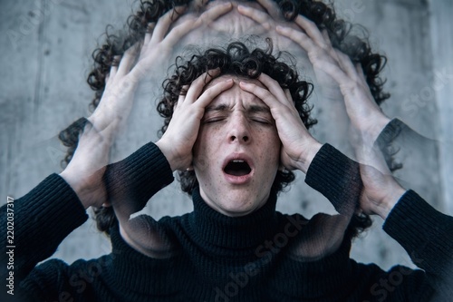 Stressed Man Screaming with Hands on Head Anxiety Concept