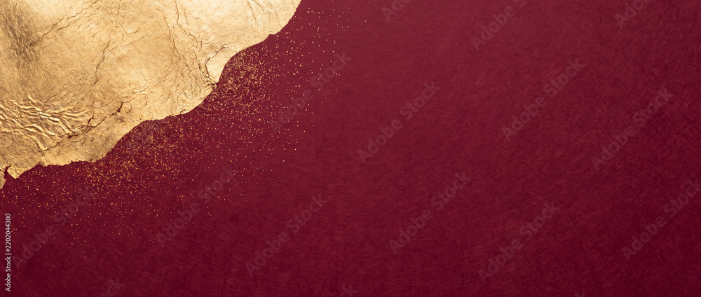 Obraz premium Gold foil on burgundy textured paper with glittering metallic dust and crinkled leaf border, offering panoramic banner copy space for luxury holiday greeting cards and elegant invitations