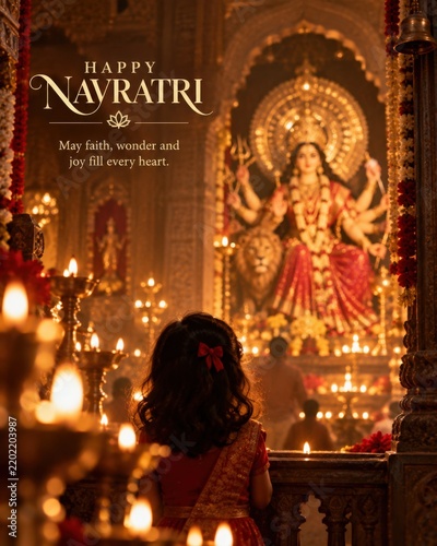 Happy Navratri: Child praying before Goddess Durga idol, lit lamps