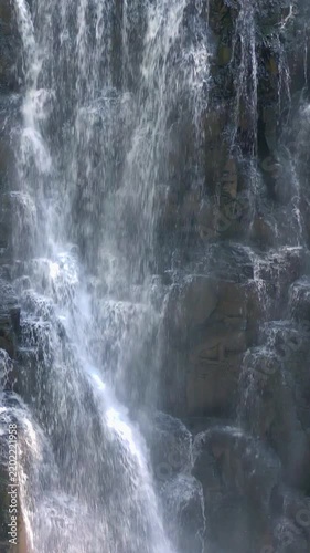 Texture of Falling Water on Dark Rock Vertical Video